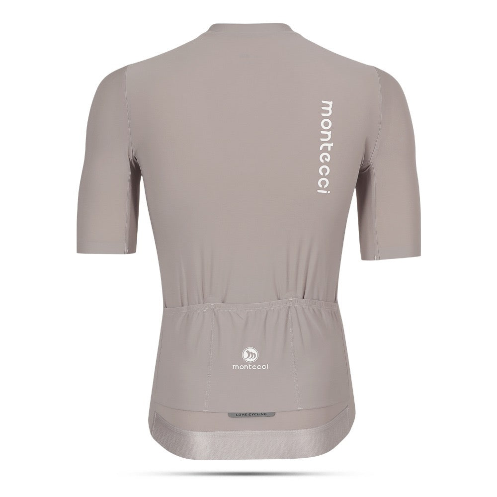 Gray cycling jersey with 'montecchi' branding on a white background