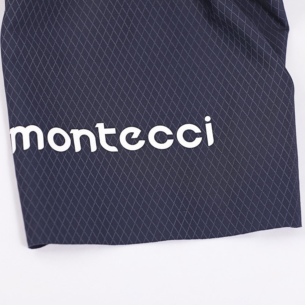 Navy shorts with white 'montecci' logo on a white background