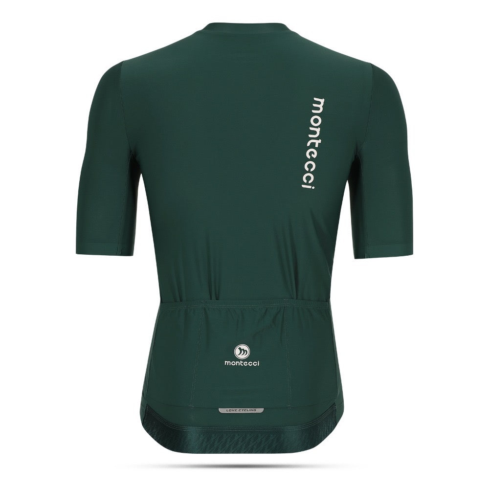 Green cycling jersey with 'montecci' branding on a white background