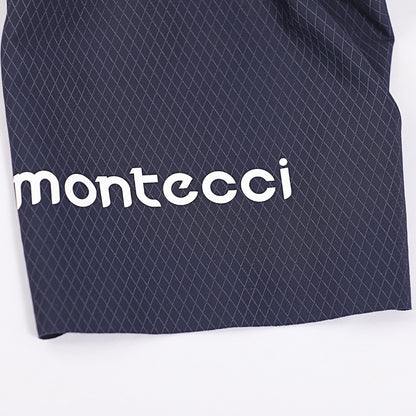Navy shorts with white 'montecci' logo on a white background