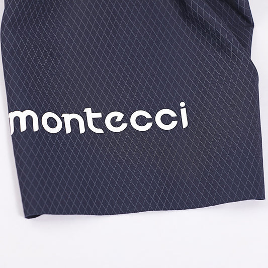 Navy shorts with white 'montecci' logo on a white background